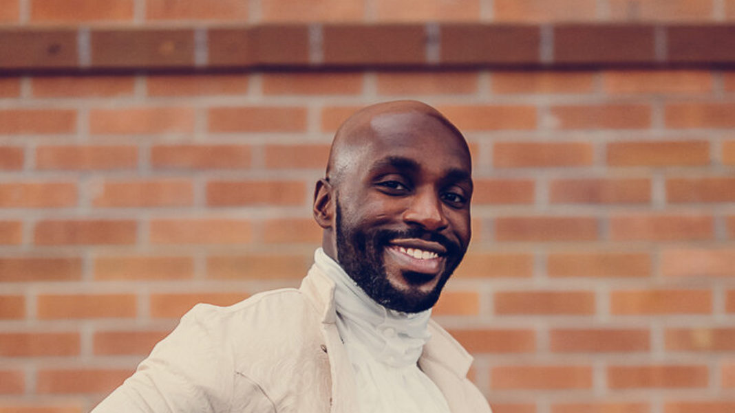 As a member of the Kuji Men's Chorus, Michael Blakk Powell can be seen and heard in 